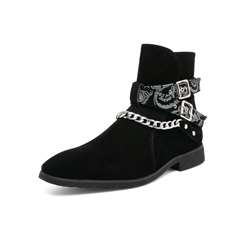 Black gothic ankle boots inner side view displaying decorative hardware straps and suede texture finish