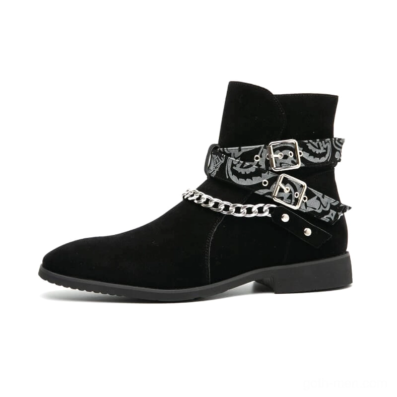 Black faux suede gothic ankle boots outer profile with double buckle and chain details on pointed toe silhouette