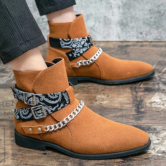Three-quarter view of black faux suede gothic ankle boots highlighting pointed toe shape and overall silhouette