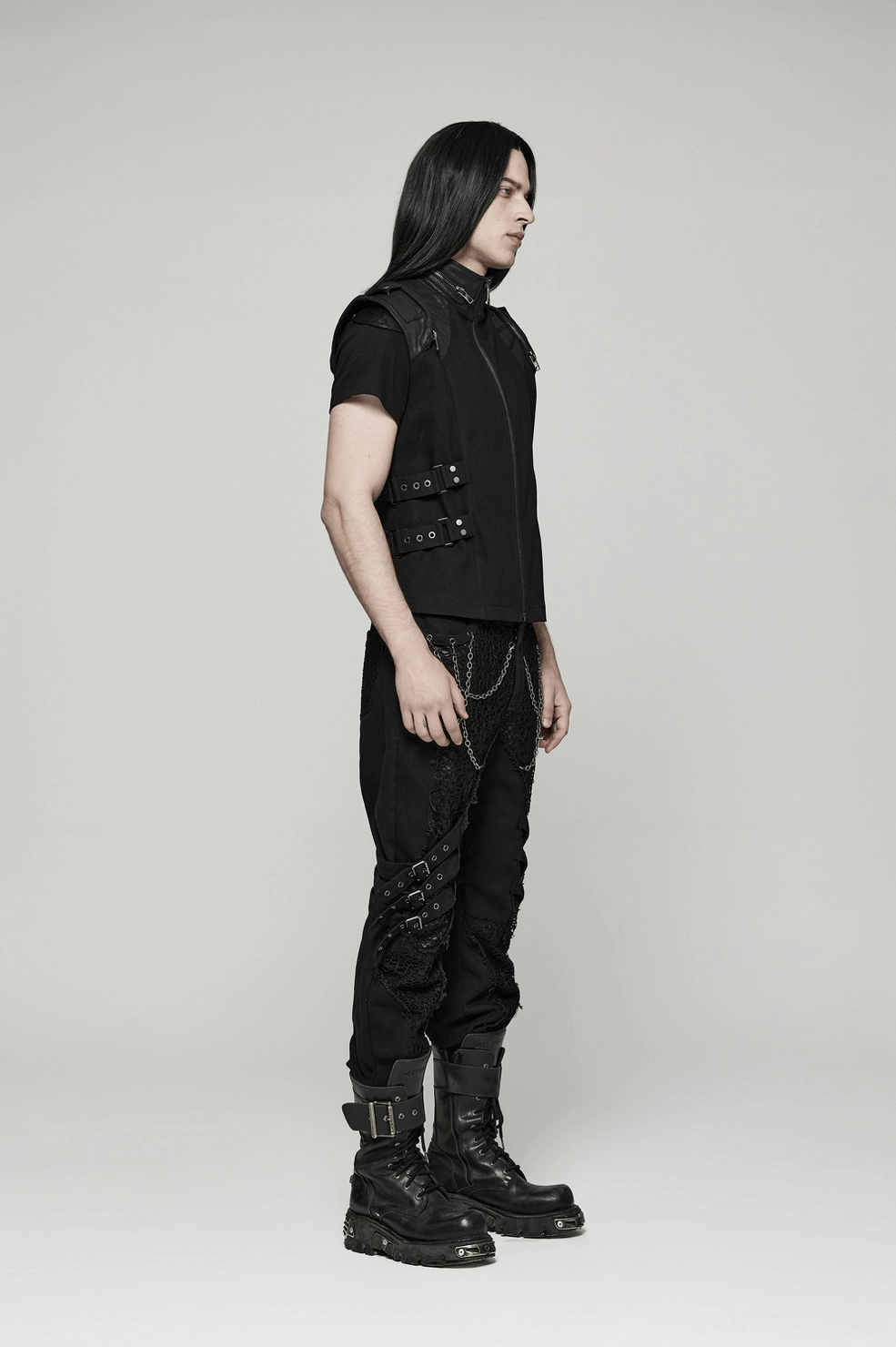 Gothic buckle vest detail focusing on leather armor panels and metal stud embellishments