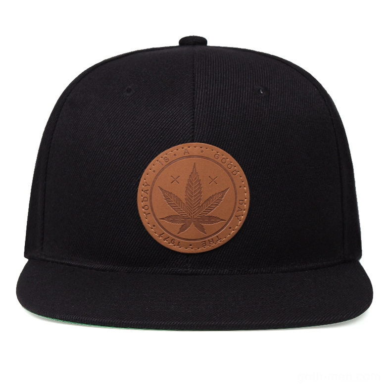 Black alternative unisex cap front view, leather maple leaf gothic emblem centered