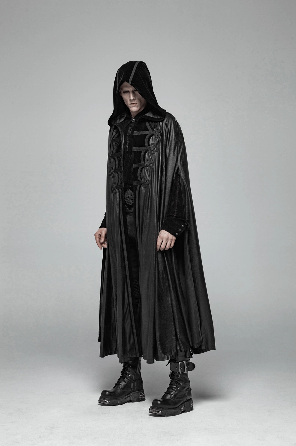 Full-length black gothic cape front view highlighting braided trim and flowing silhouette