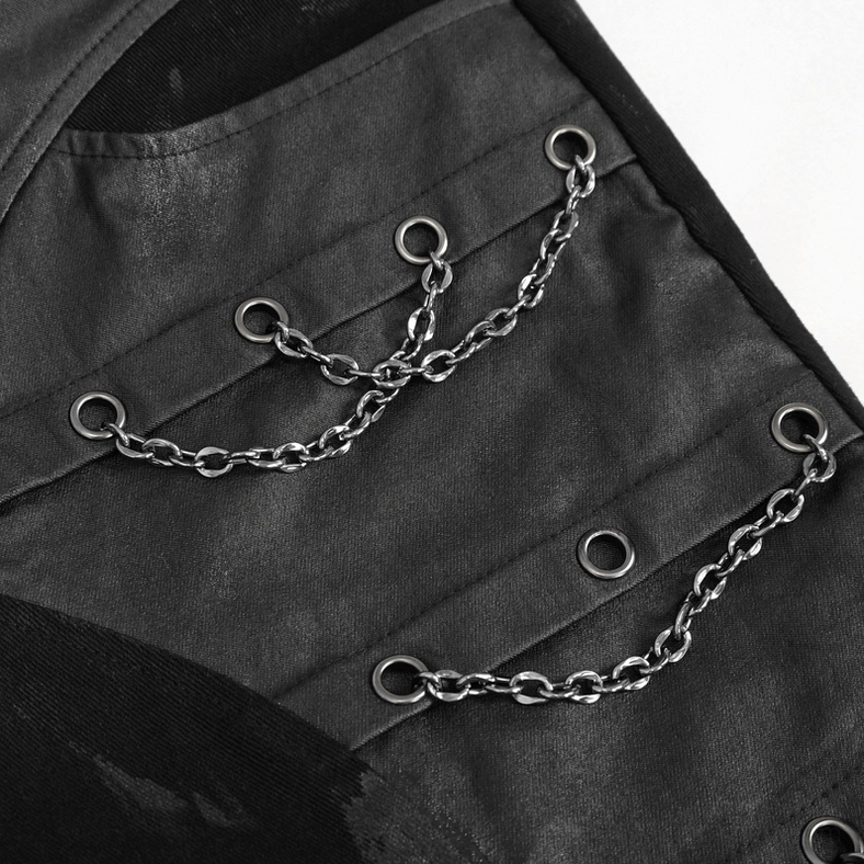 Close-up detail of black gothic cargo pants metal chain trims and grommet fasteners on pocket