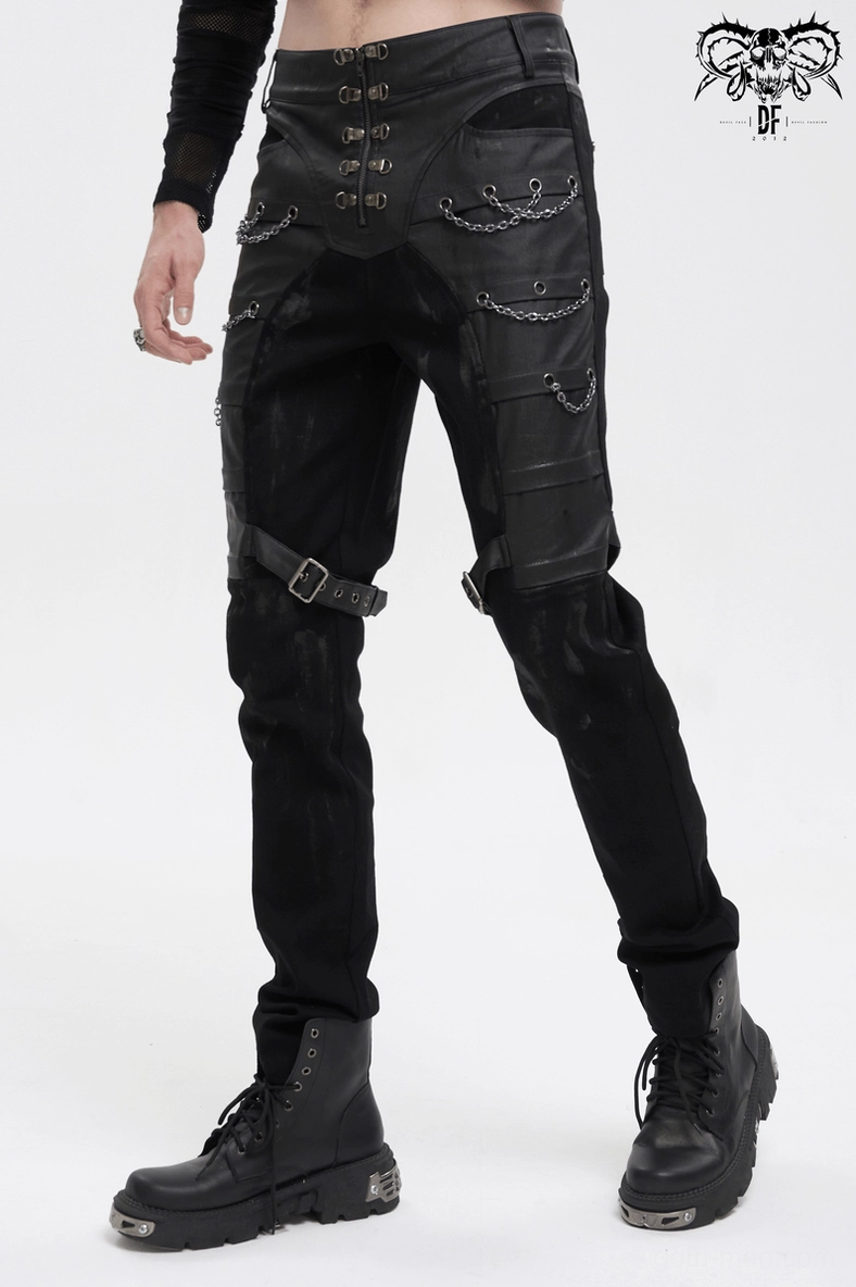 Black gothic cargo pants all-over construction detail showing chain placement and buckle positioning