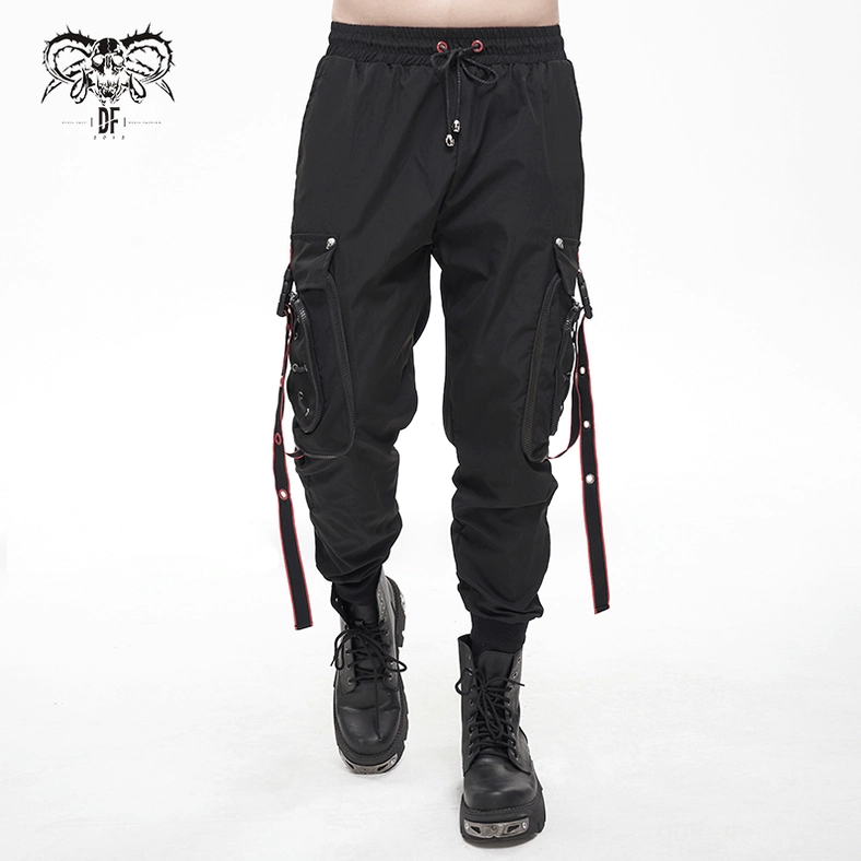 Black gothic cargo trousers construction detail showing fabric weave and seam quality