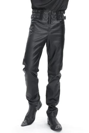 Black gothic buckle lace-up cargo pants front view - male model wearing fitted silhouette with metal buckles and decorative chains on high waistband