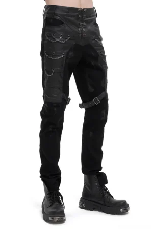 Black gothic cargo pants front three-quarter view with thigh buckle straps and chain details on male model