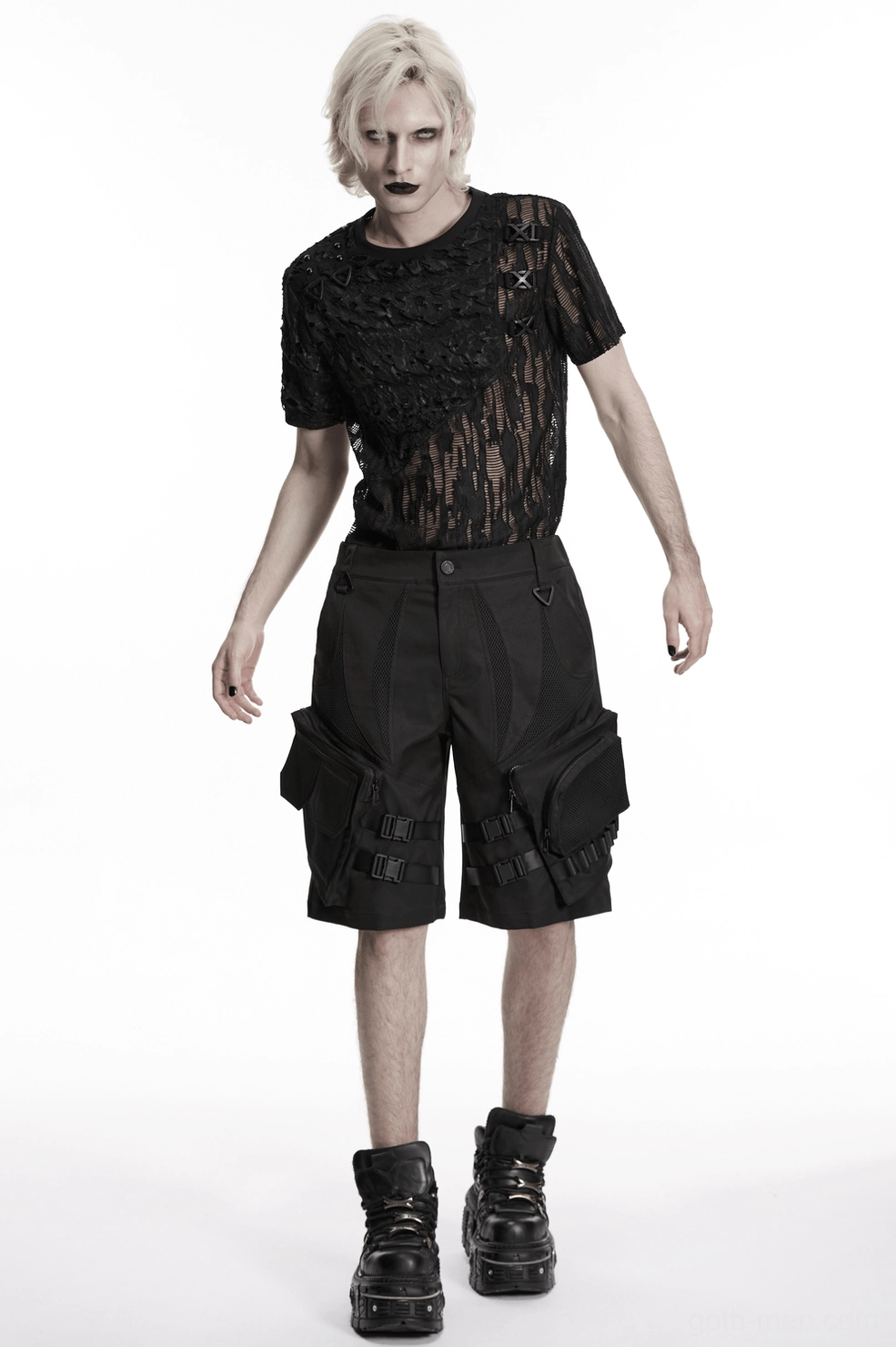 Close-up texture view of black gothic cargo shorts woven fabric and honeycomb mesh blend