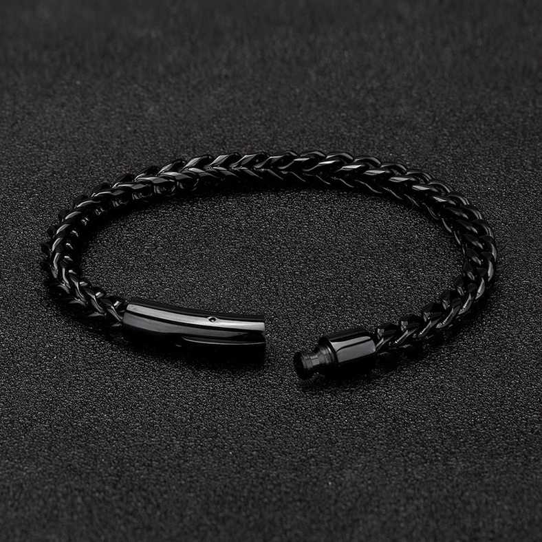 Black stainless steel gothic braided chain bracelet - flat lay with smooth push lock clasp detail