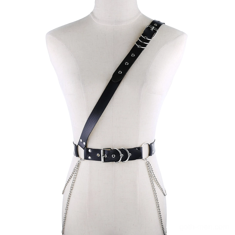 Black gothic one-shoulder chain harness belt with silver metal rings and adjustable buckles, front view on mannequin