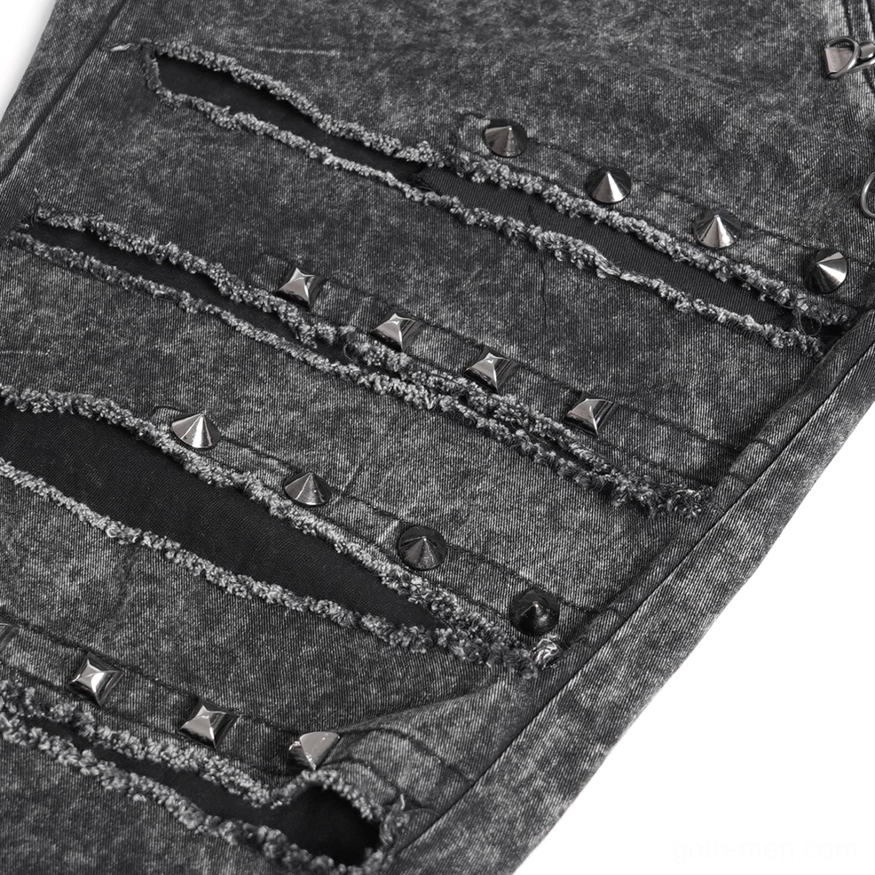 Black distressed gothic jeans chain harness detail, heavy-duty steel chains through industrial eyelets, extreme leg slashes and punk aesthetic
