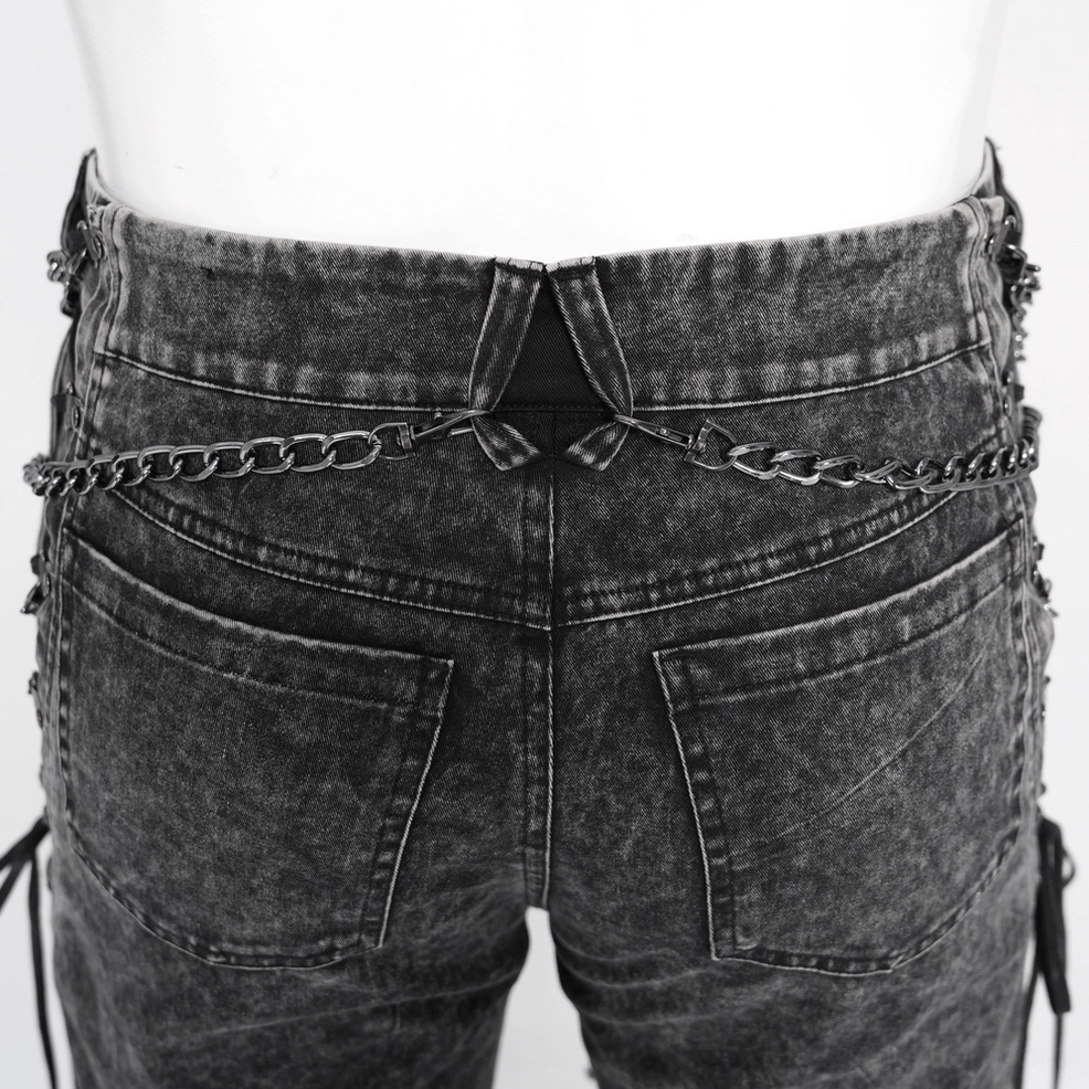 Black distressed gothic chain jeans texture detail, acid-wash pattern on 100% cotton denim with ripped sections and hardware elements