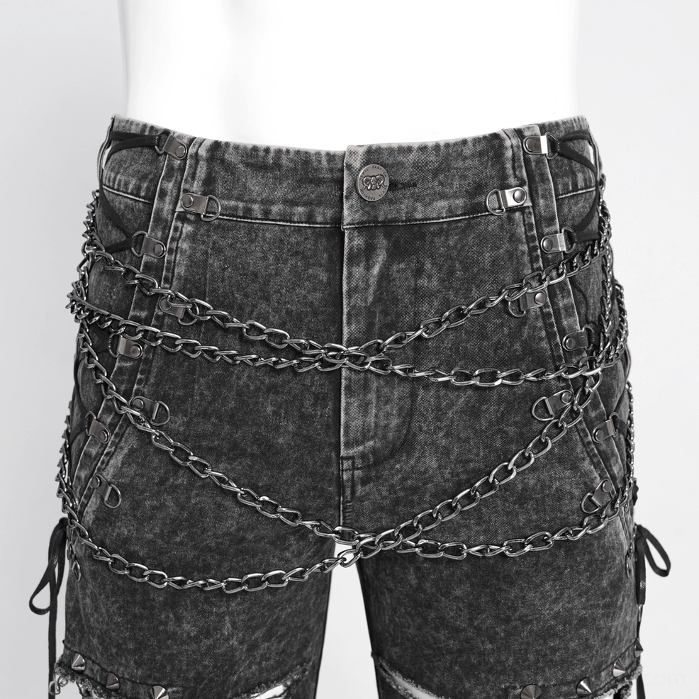 Black gothic chain jeans from flat lay perspective, complete view of chain harness system and extreme leg rip construction detail
