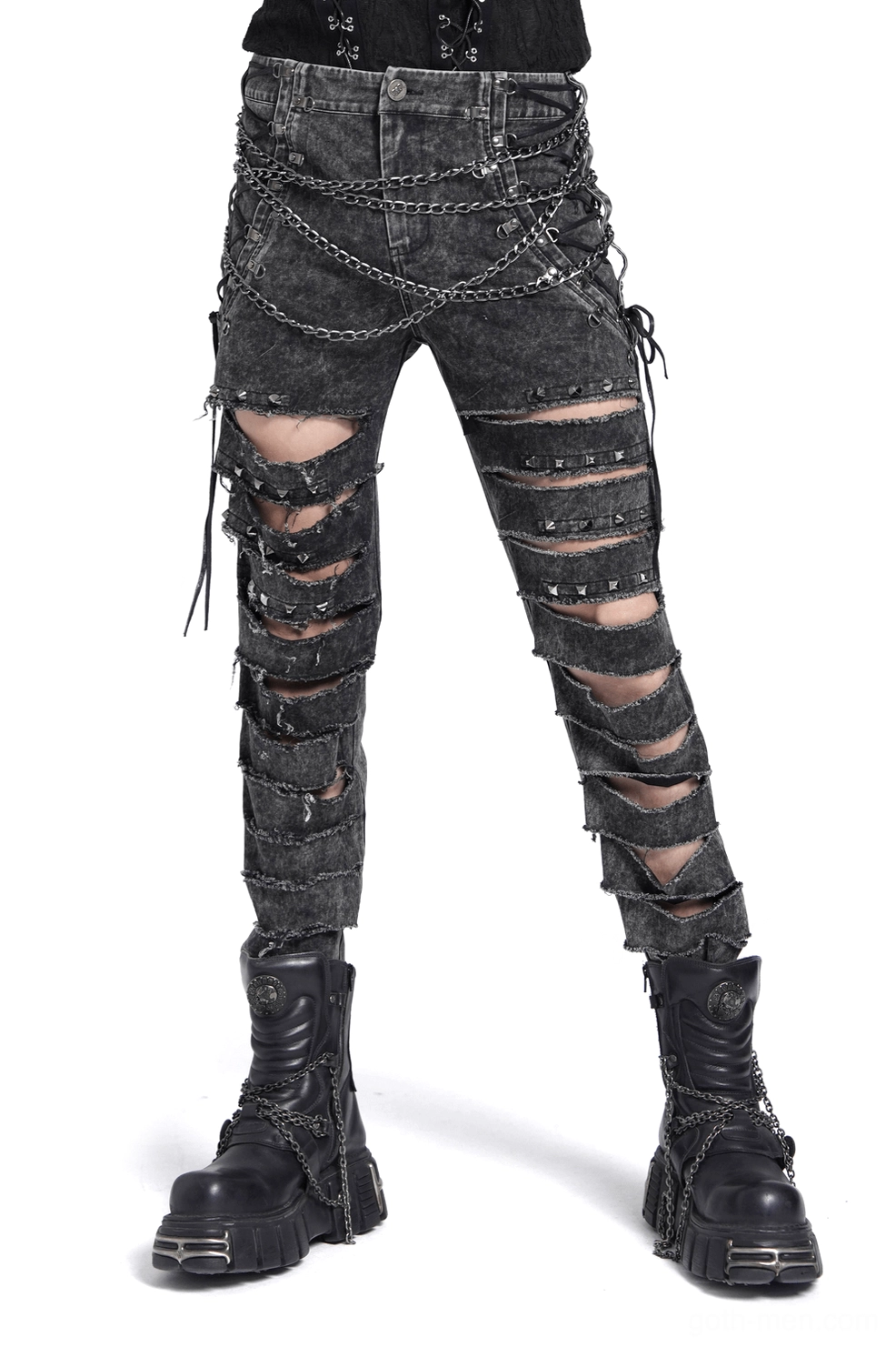 Black distressed gothic chain jeans front view on male model, acid-washed denim with extreme leg slashes and metal chain harness details, white studio background