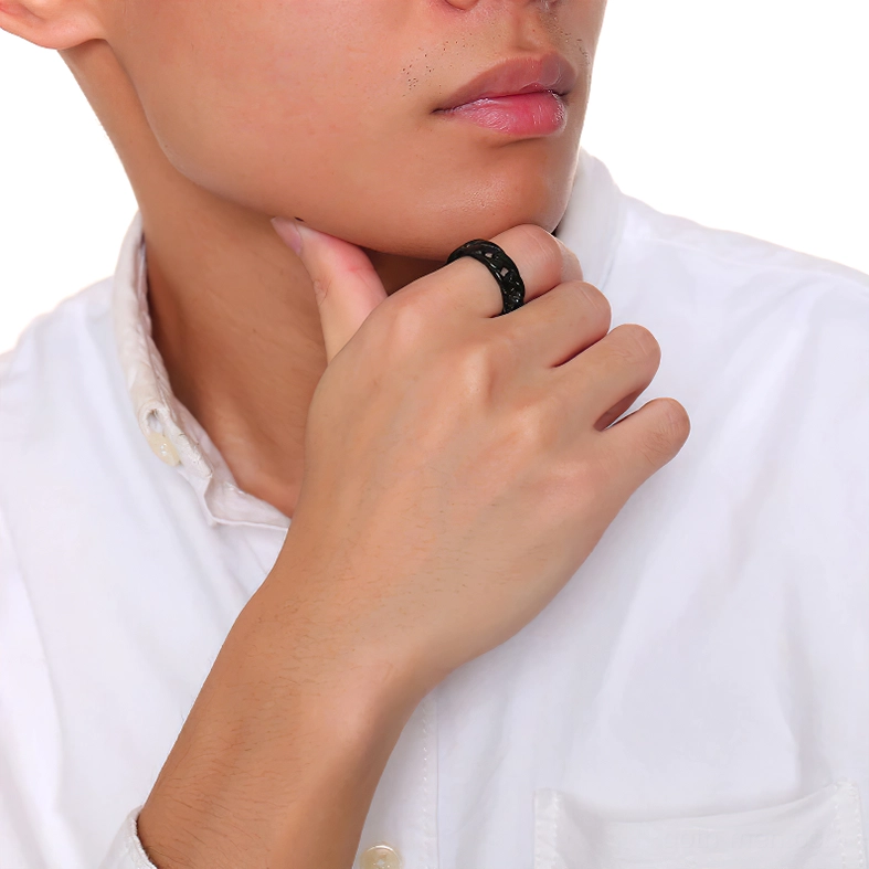 Black gothic curb chain ring worn on male hand, side close-up view showing ring fit and texture detail