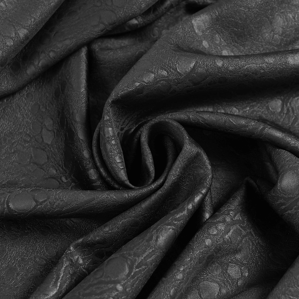 Black industrial gothic shirt hem detail showing textured matte finish polyester and structural tailoring of button-up design