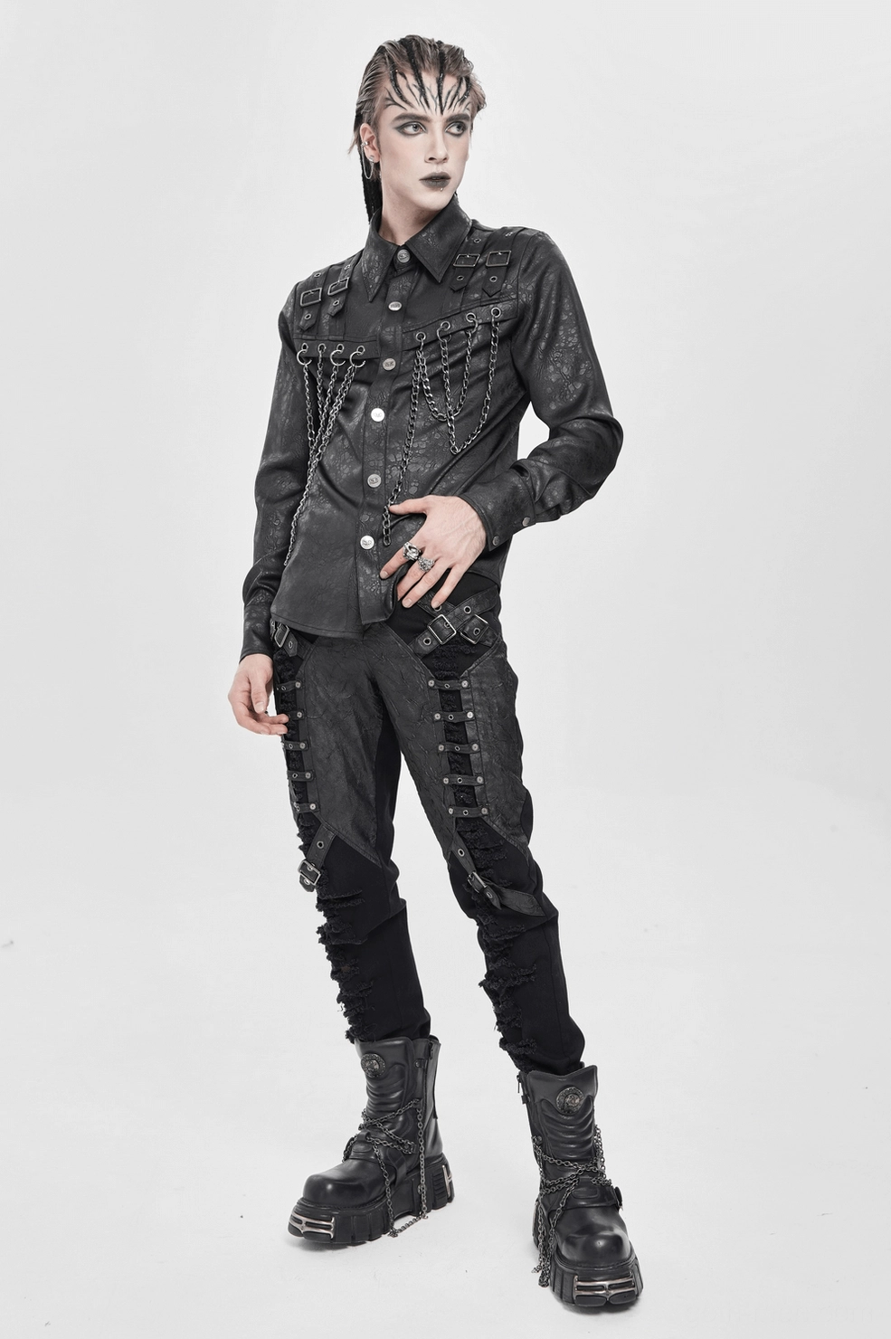 Black gothic chain buckle shirt with male model showing how metal chain details catch light in performance lighting conditions