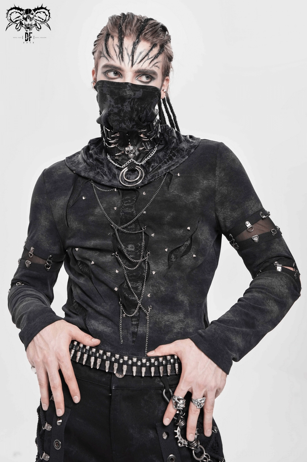 Styled shot of black gothic chain top demonstrating layering and alternative fashion aesthetic