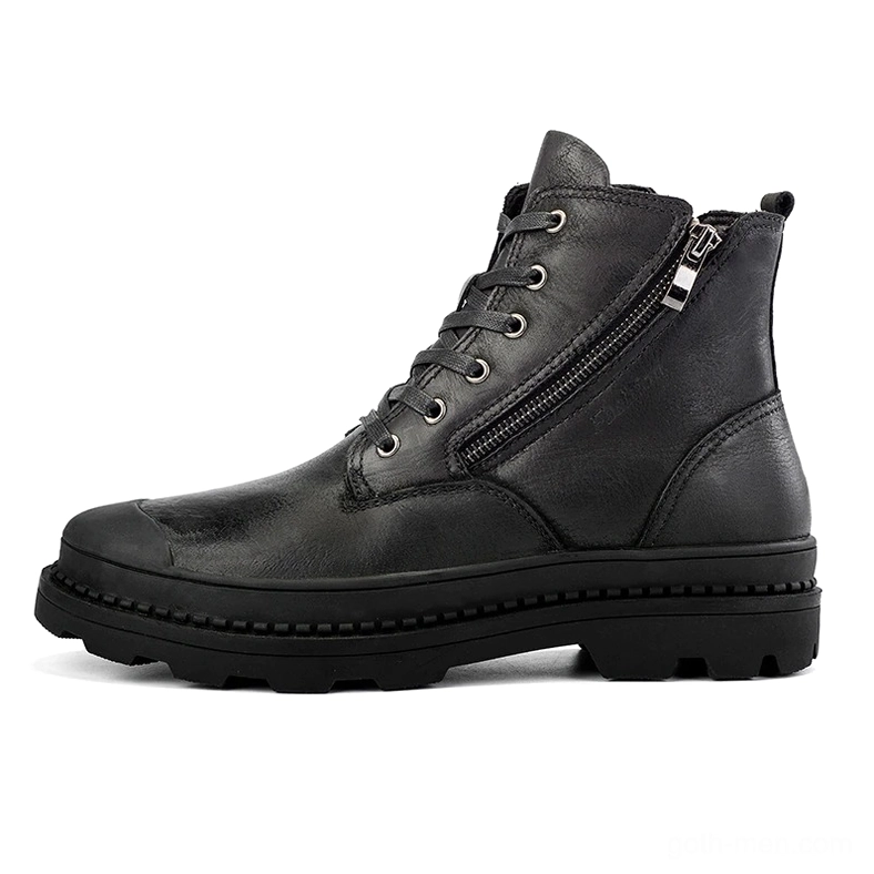 Black leather gothic ankle combat boot left side profile showing thick rubber lug sole and side zipper hardware