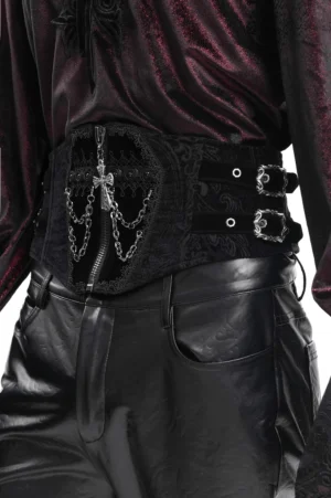 Male model wearing black gothic corset belt in 3/4 side view, displaying side buckle straps and embossed detailing on torso