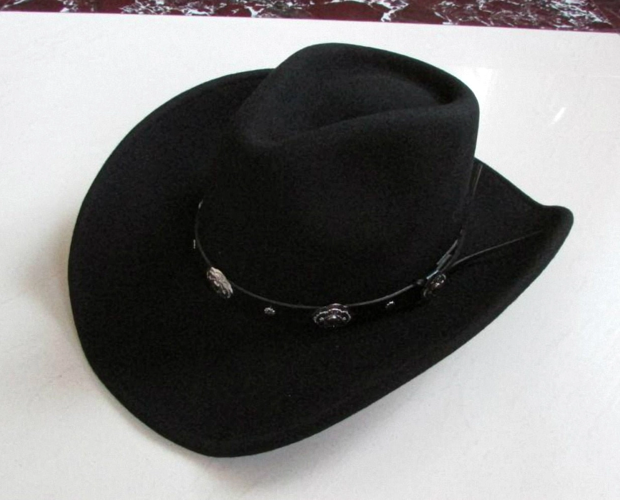 Right three-quarter view of black gothic cowboy hat with decorative leather band and curved wide brim