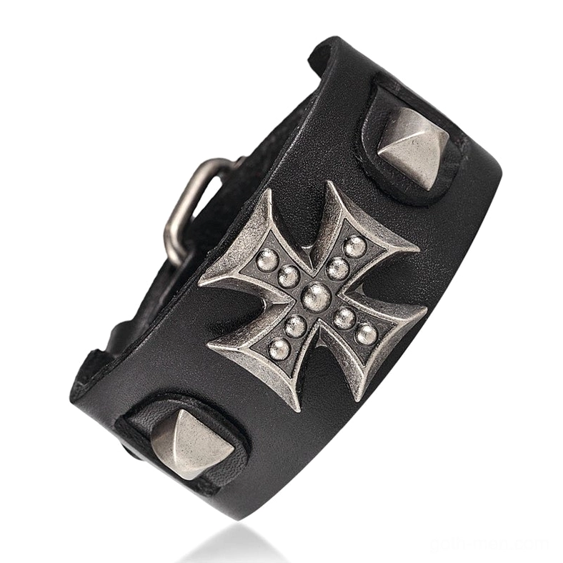 Black leather gothic cross cuff bracelet angled side perspective highlighting metal cross and stud embellishments