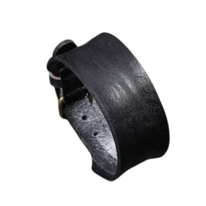 Black wide leather gothic cuff bracelet, side view showing genuine cowhide texture and adjustable bronze buckle