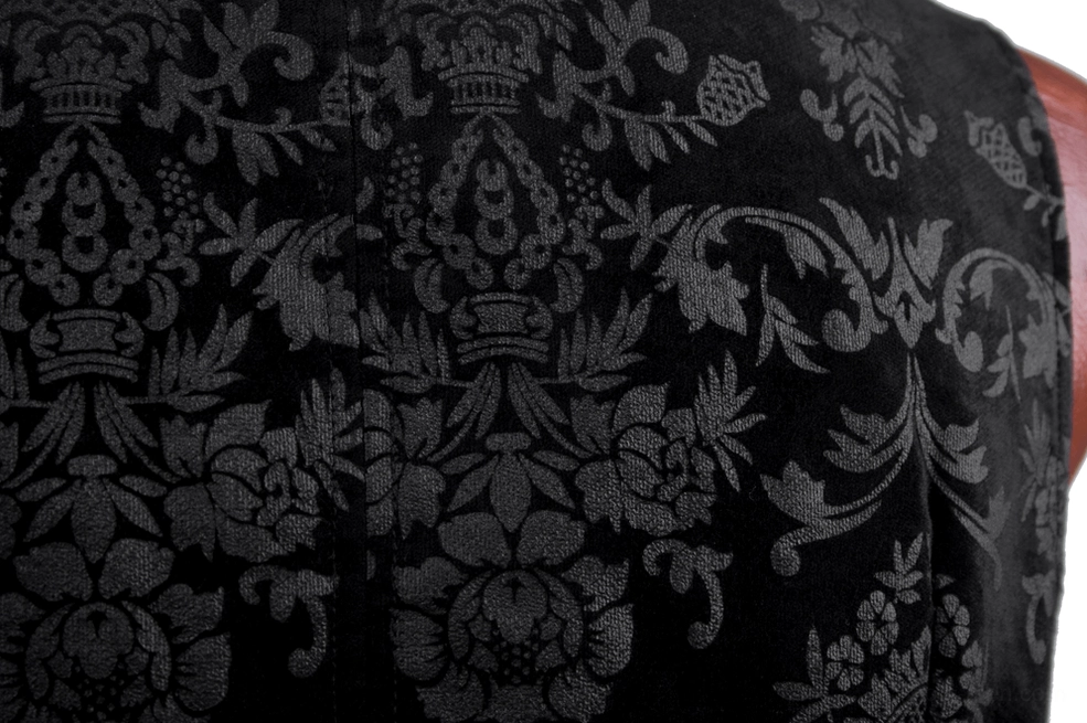 Fabric texture close-up of black gothic damask jacquard showing vintage floral and crown motifs