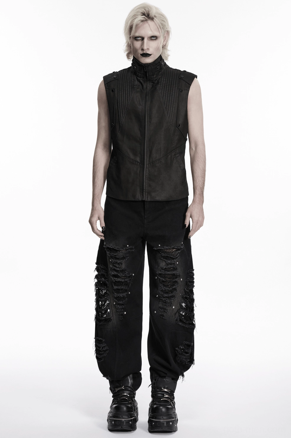Black gothic punk denim pants model seated pose showing leg zipper and distressed details