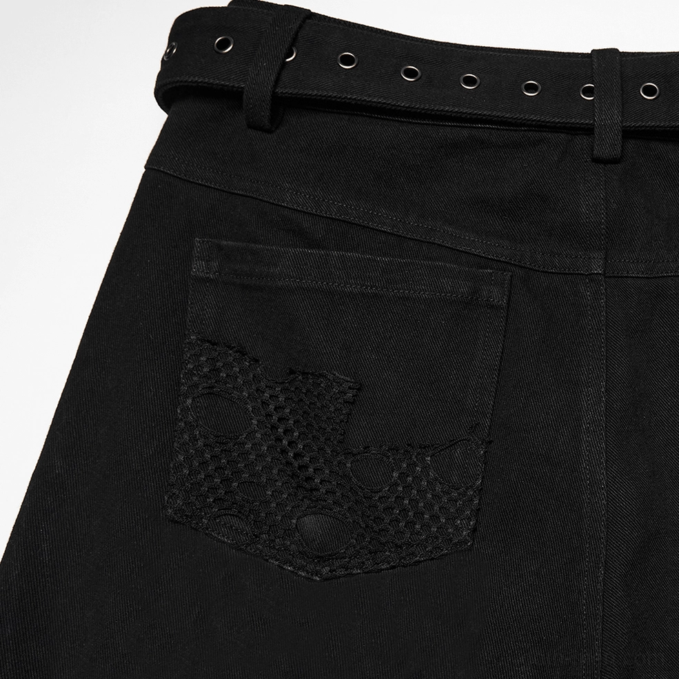 Close-up detail black denim waist and back pocket mesh panel metal grommet belt