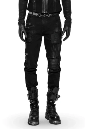 Black gothic distressed cargo pants front view worn by male model showing ripped details and fitted silhouette