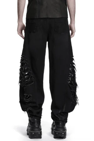 Black punk denim pants rear view full body shot distressed mesh panels combat boots