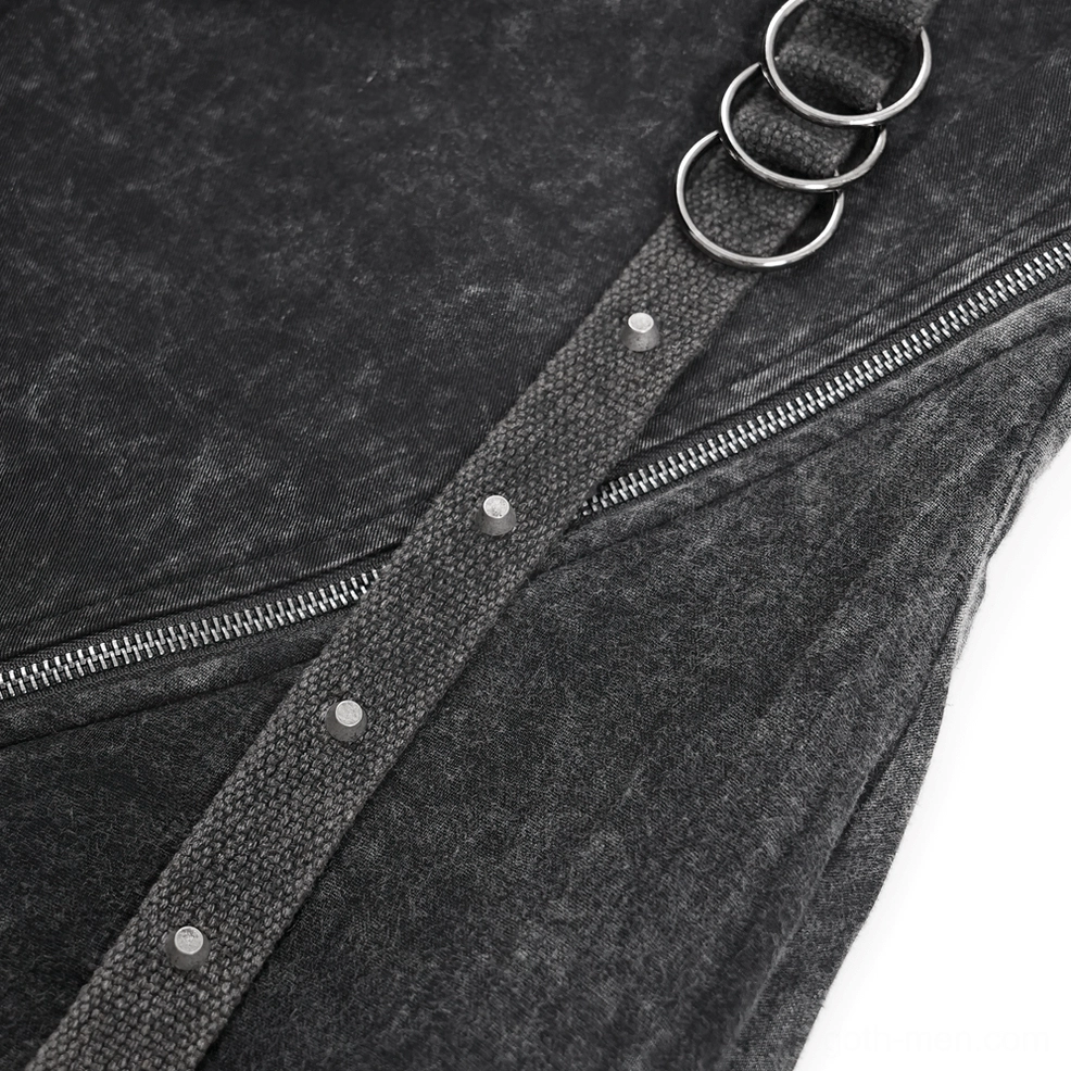 Overhead detail shot of woven side strap with metal D-rings, zipper, and stud fasteners on black denim