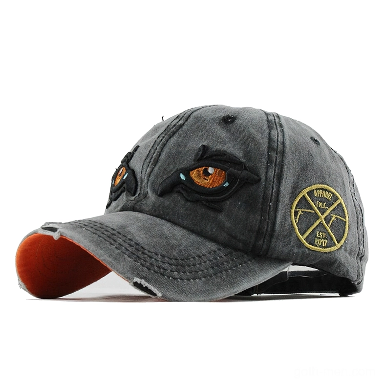 Black gothic eagle eye embroidered unisex baseball cap with golden logo, front three-quarter view