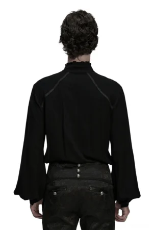 Victorian black gothic shirt rear view on model, showcasing raglan seams, flowing lantern sleeves, and embroidered details paired with gothic embroidered pants