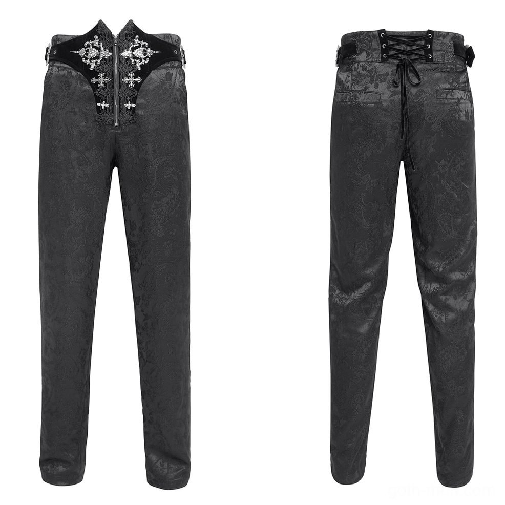 Flat lay display of black gothic embroidered pants featuring silver cross embroidery and zip front closure