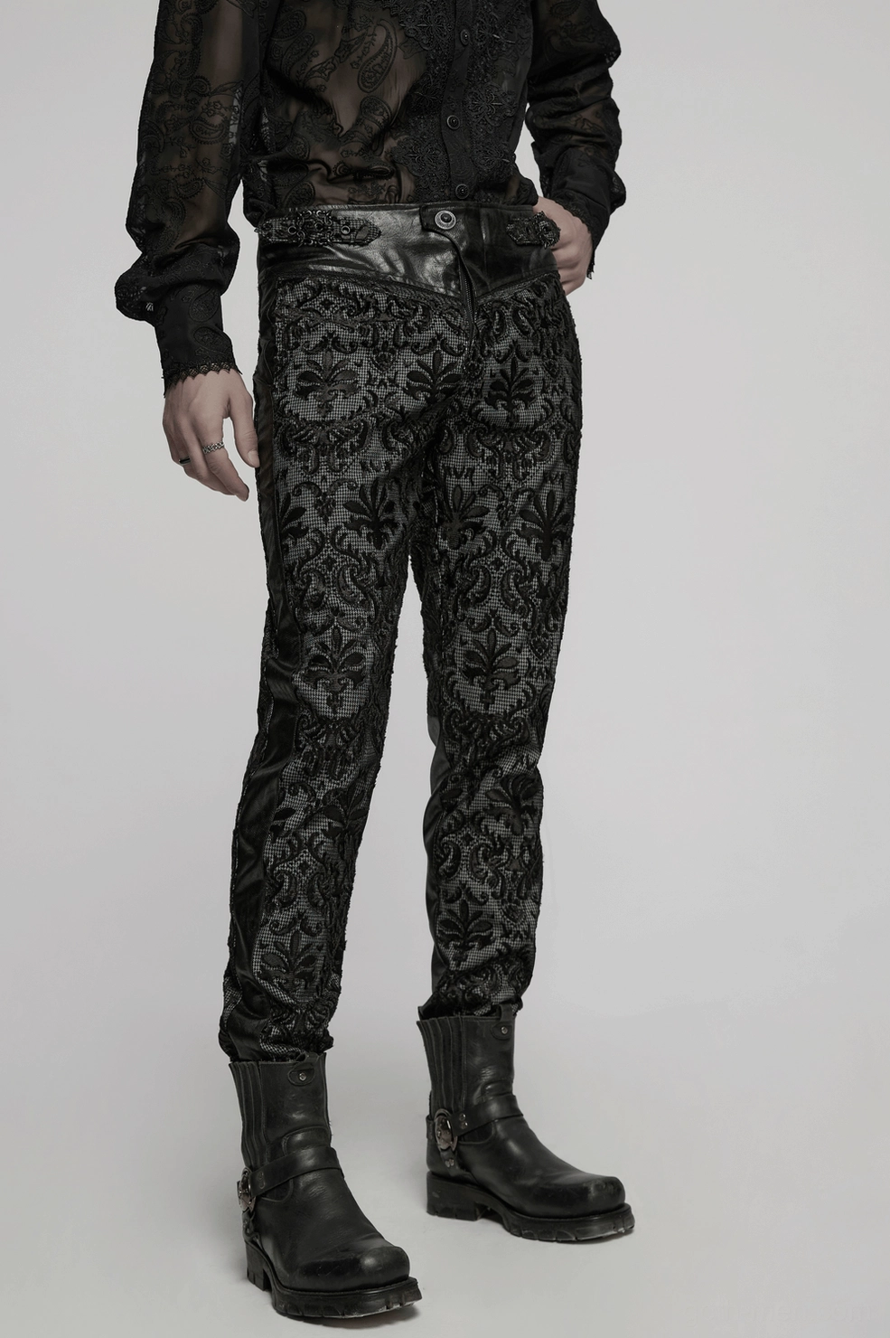 Additional angle of black gothic embroidered lace trousers showing overall silhouette and slim cut