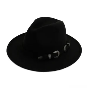 Black vintage trilby fedora hat with antique western belt buckle detail, front flat lay view on white background
