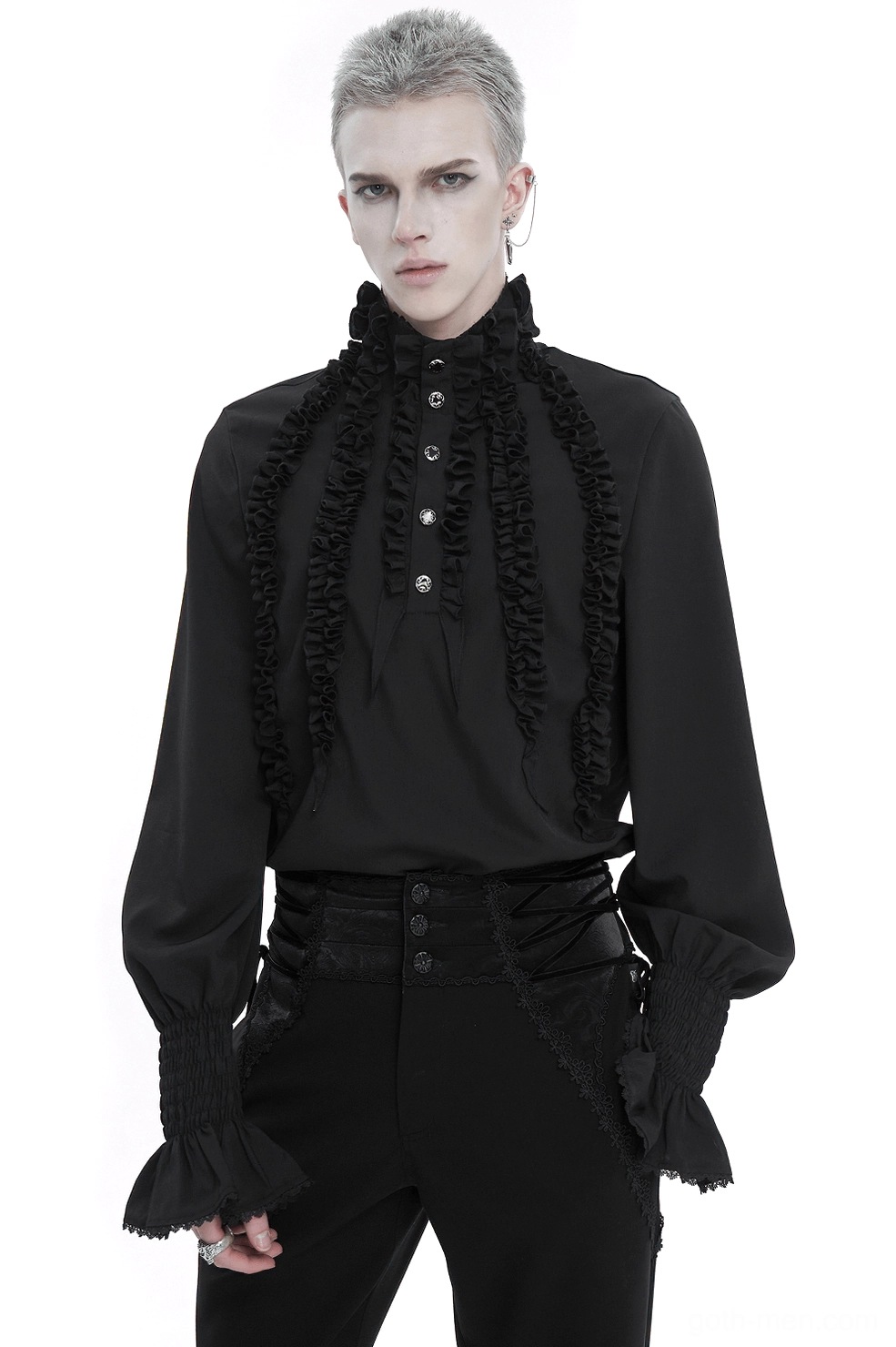 Black ruffled gothic shirt front view on model, featuring layered frilly panels and smocked cuffs, stand collar