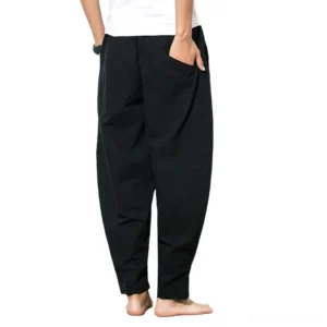 Black linen harem pants back view showing loose wide leg cut and relaxed fit