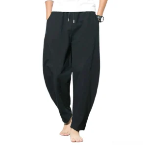 Black gothic linen harem pants front view with drawstring waist and side pockets