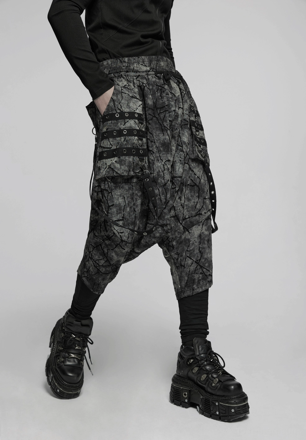 Black tie-dye gothic harem pants pocket detail featuring multi-strap eyelet design and metal hardware