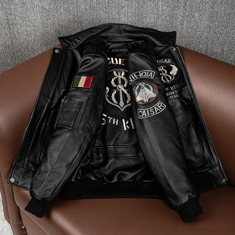 Black gothic embroidered leather jacket back and sleeve detail showing Italian flag patch and ribbed cuffs