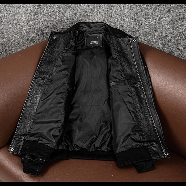 Black leather gothic motorcycle jacket interior view showing black nylon lining and reinforced hem construction