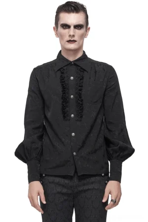 Black gothic jacquard shirt with lace ruffle placket and voluminous lantern sleeves, front view on male model
