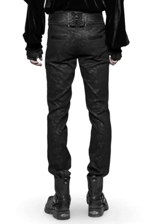 Black gothic skinny jeans rear view highlighting dramatic corset-inspired lace-up back closure with braided detail and embossed leather waist panel