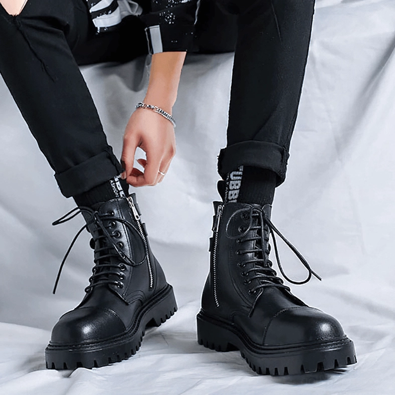 Black gothic lace-up ankle boots detailed studio shot with complete silhouette