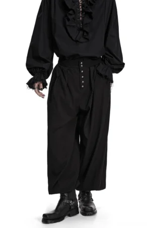 Black gothic pleated lantern pants front full-body view on male model, showcasing dramatic wide leg silhouette and metal button placket detail