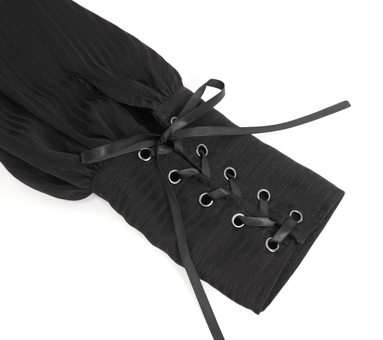 Lantern sleeve cuff detail showing lace-up ribbon adjustable closure and black fabric tie construction