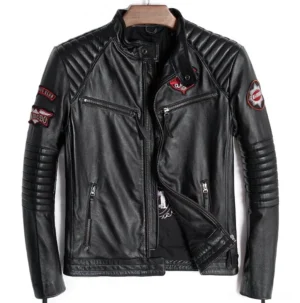 Black leather gothic motorcycle jacket front view on wooden hanger showing zippered pockets and embroidered patches